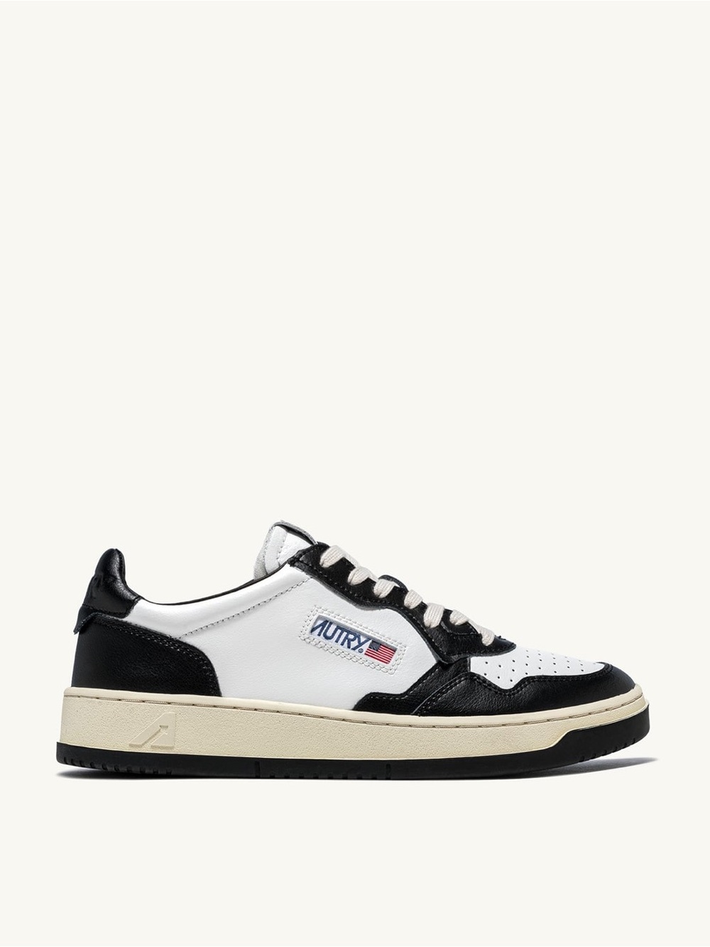 Autry Women’s Low-Top Leather Sneakers in Black and White